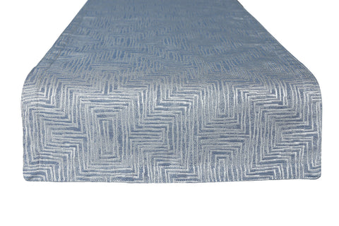 Textured blue fabric with geometric pattern on a white background